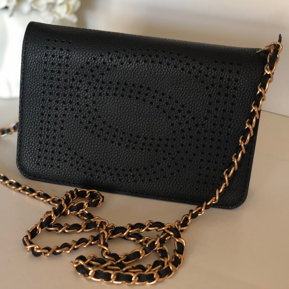 Bebe black and gold crossbody purse